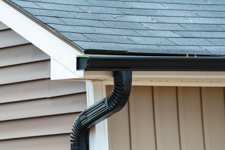 how to clear gutter downspout